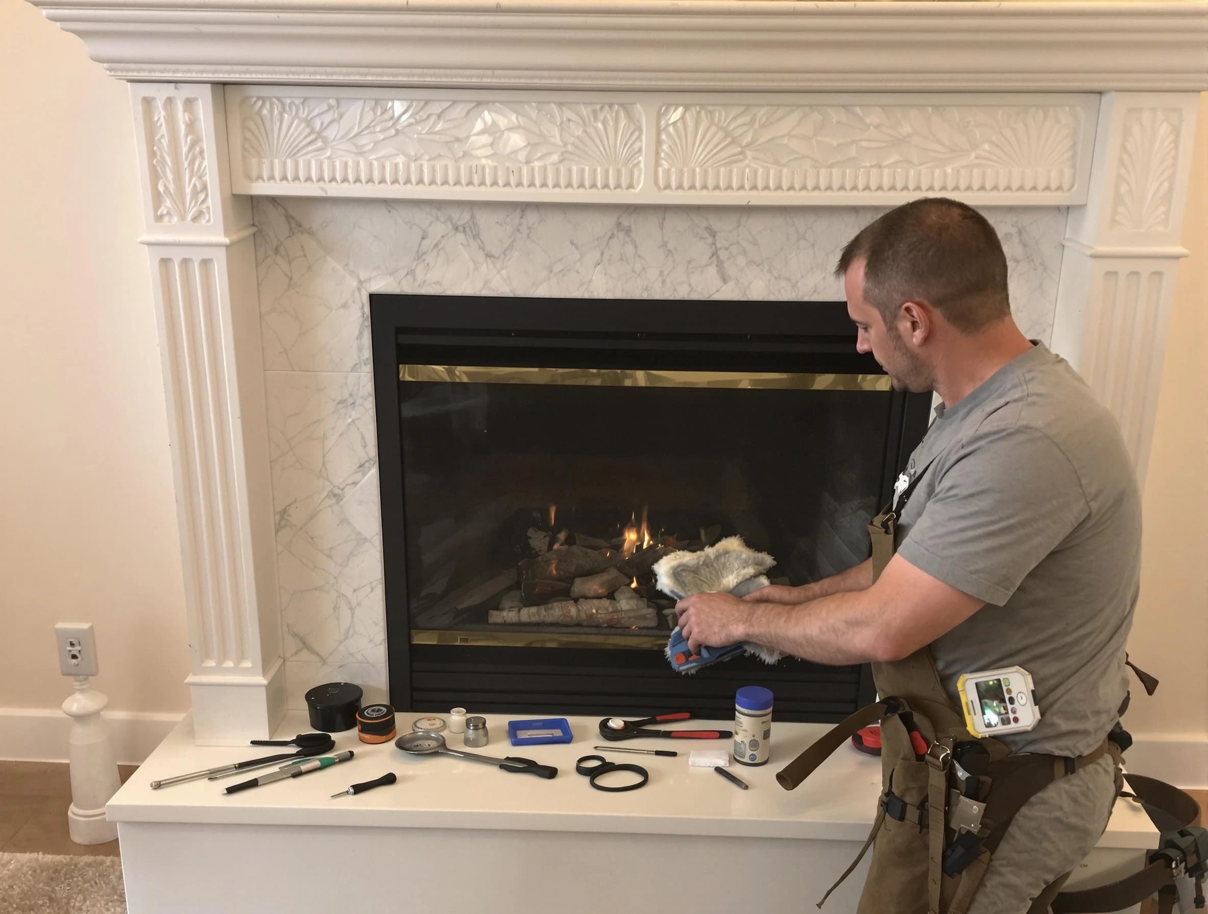 Taylorsville Chimney Sweep performing fireplace maintenance in Taylorsville, UT